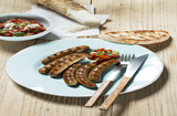 BARBECUED NUREMBERG ROSTBRATWURST WITH VANILLA AND TOMATO RAGOUT AND FRESH BAVARIAN HORSERADISH